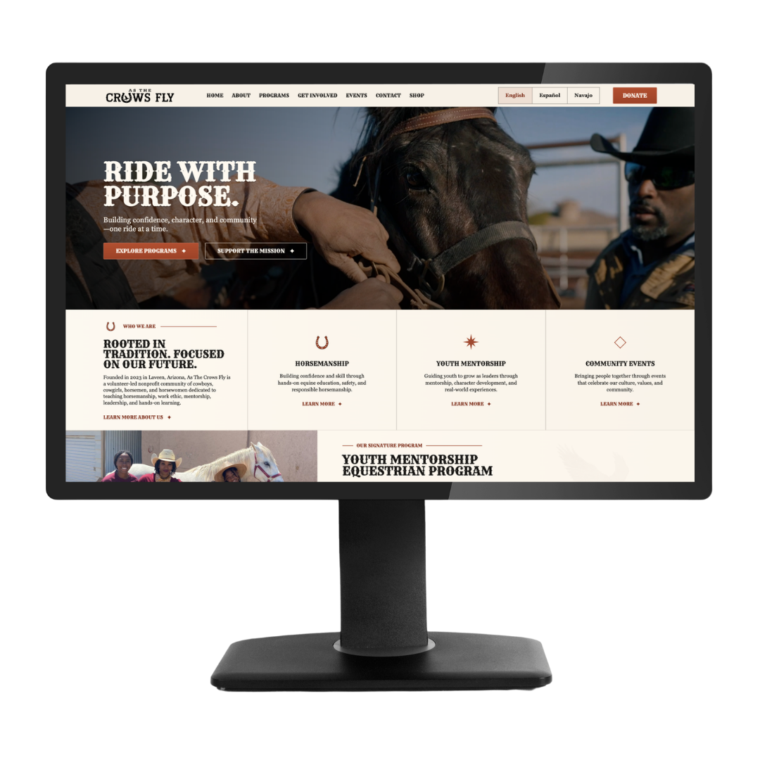 As The Crows Fly website homepage on a laptop